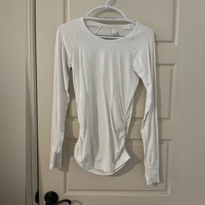 White athleta long sleeve momentum seamless top. Size: XS